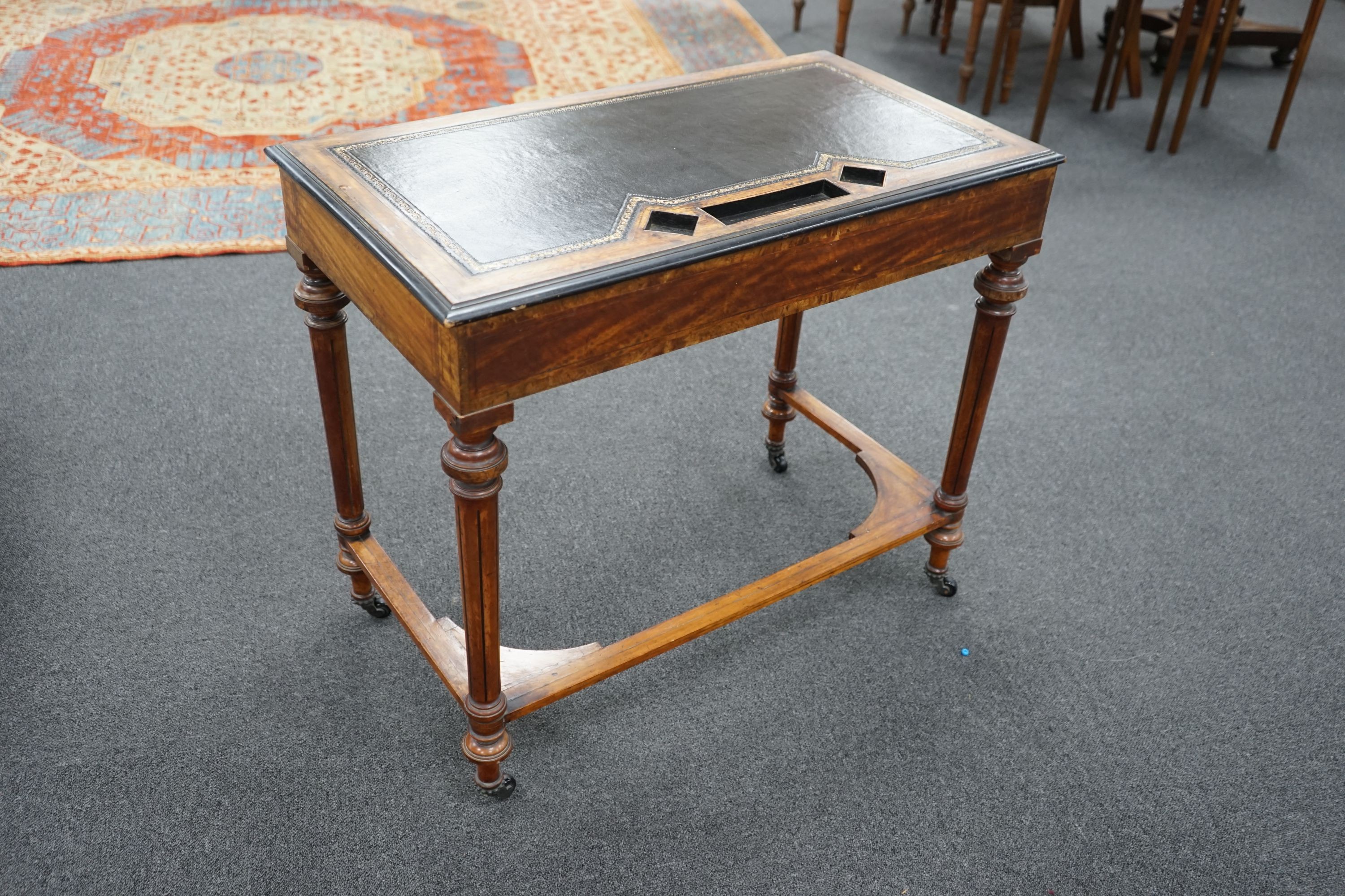 An Edwardian satinwood two drawer writing table, width 83cm, depth 45cm, height 72cm